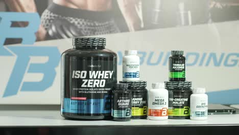 sport nutrition store interior with large choice of nutritional supplements.