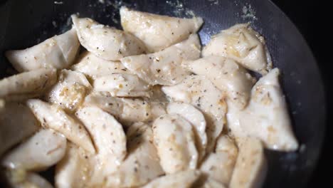 steam rising from fried dumplings in kitchen