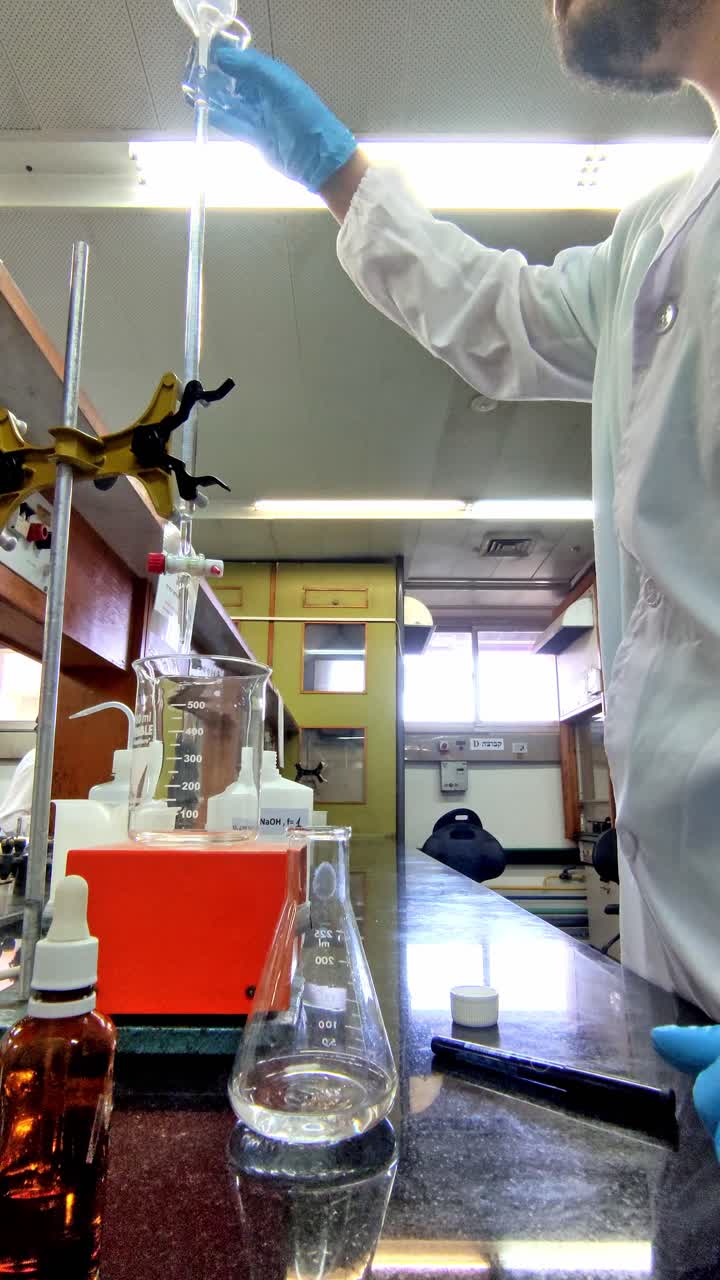 Man in Protective Gear in Chemistry Lab