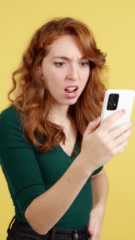 frustrated woman reacting to smartphone content