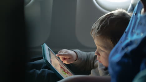 Little-boy-traveling-in-an-airplane