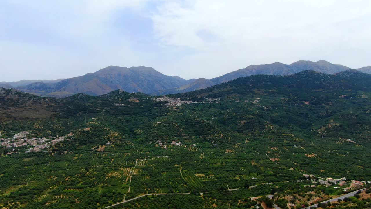 the fertile plains of Lasithi Plateau In Crete, majestic green landscape, aerial