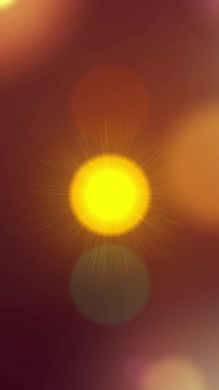 Animazione di sfere di luce luminose ed effetti bokeh su sfondo scuro
