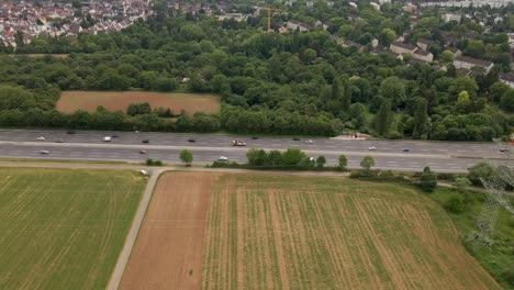 Afternoon-traffic-moving-along-the-Highway-a66-past-Eschborn-in-Hesse,-Germany