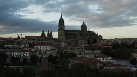 view of new and old cathedrals of salamanca in spain with overcast