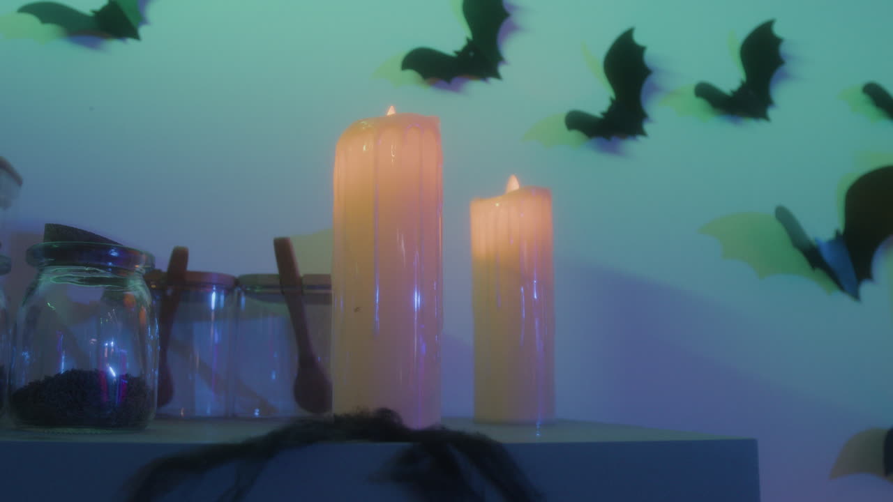 Halloween Decorations with Candles and Bats