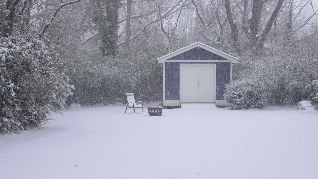 A snow covered suburban backyard in Atlanta, Georgia on January 10th, 2025.
