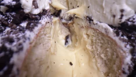 inside cookies and cream donut close up opening filmed with laowa 24 macro