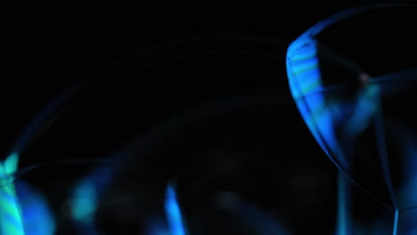 blue bubbles on black background, dark abstract design