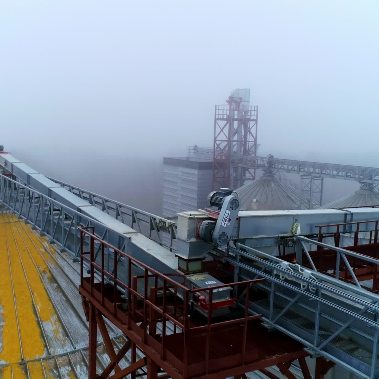 Factory steel building containers. Big industrial elevator storage aerial view