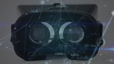 Network-of-connections-and-data-processing-against-close-up-of-vr-headset
