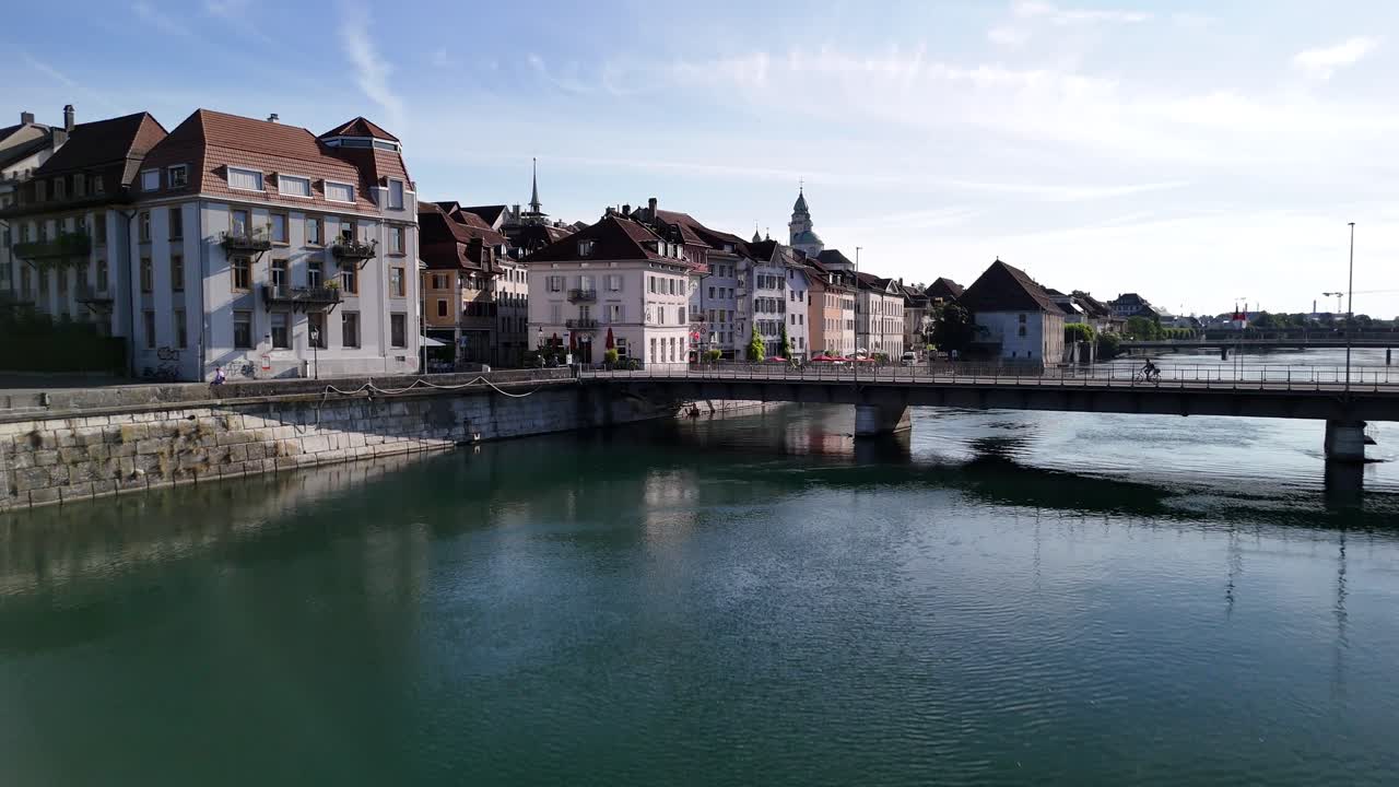 FLIRT train over Solothurn town bridge Switzerland aerial drone old square