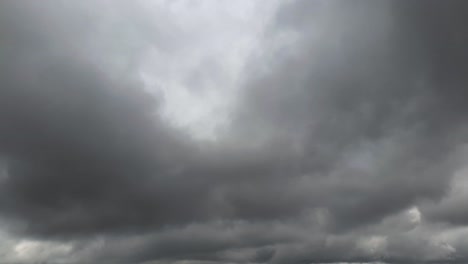 Mid-afternoon-thunderstorm-rain-clouds-forming-and-blending-across-the-african-horizon-time-lapse,-noise-free-4k-footage