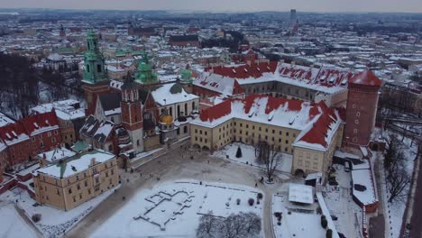 aerial view of wawel castle and wawel cathedral in krakow, poland - winter with snow