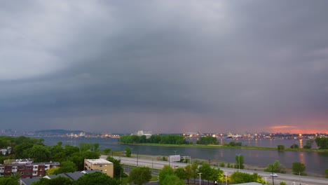 dark storm clouds gather for rainfall near the loyola campus, concordia university, montreal, canada