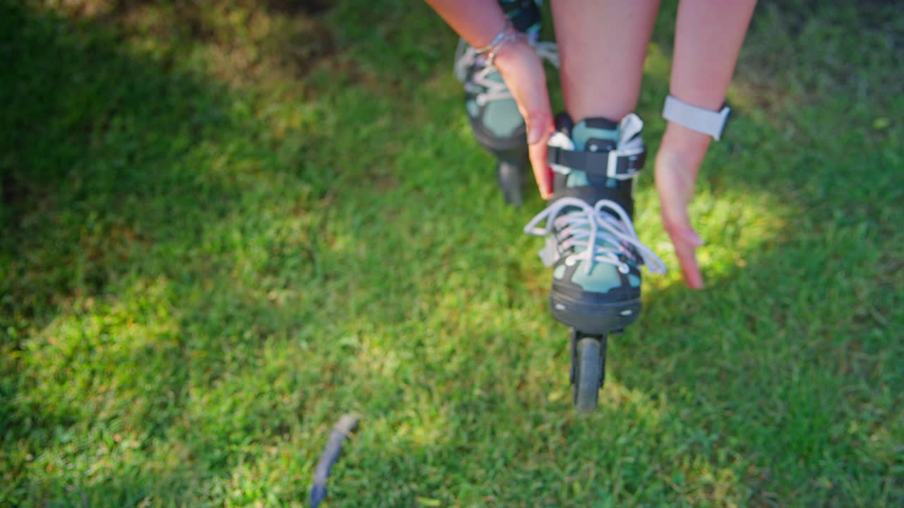 Person Roller Skating on Grass