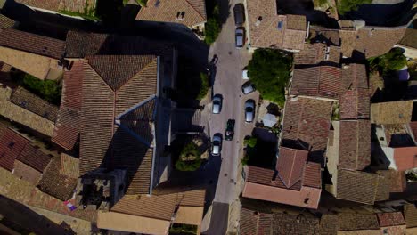 Top-down-shot-of-a-car-turning-into-a-street-of-luxury-villas-in-St-Clément-de-la-Riviere