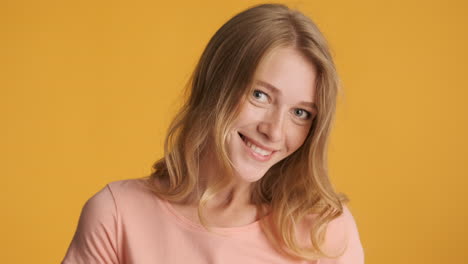 caucasian woman looking around on camera.