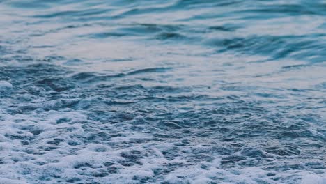 sea beach sand background. soft wave of ocean on sandy beach