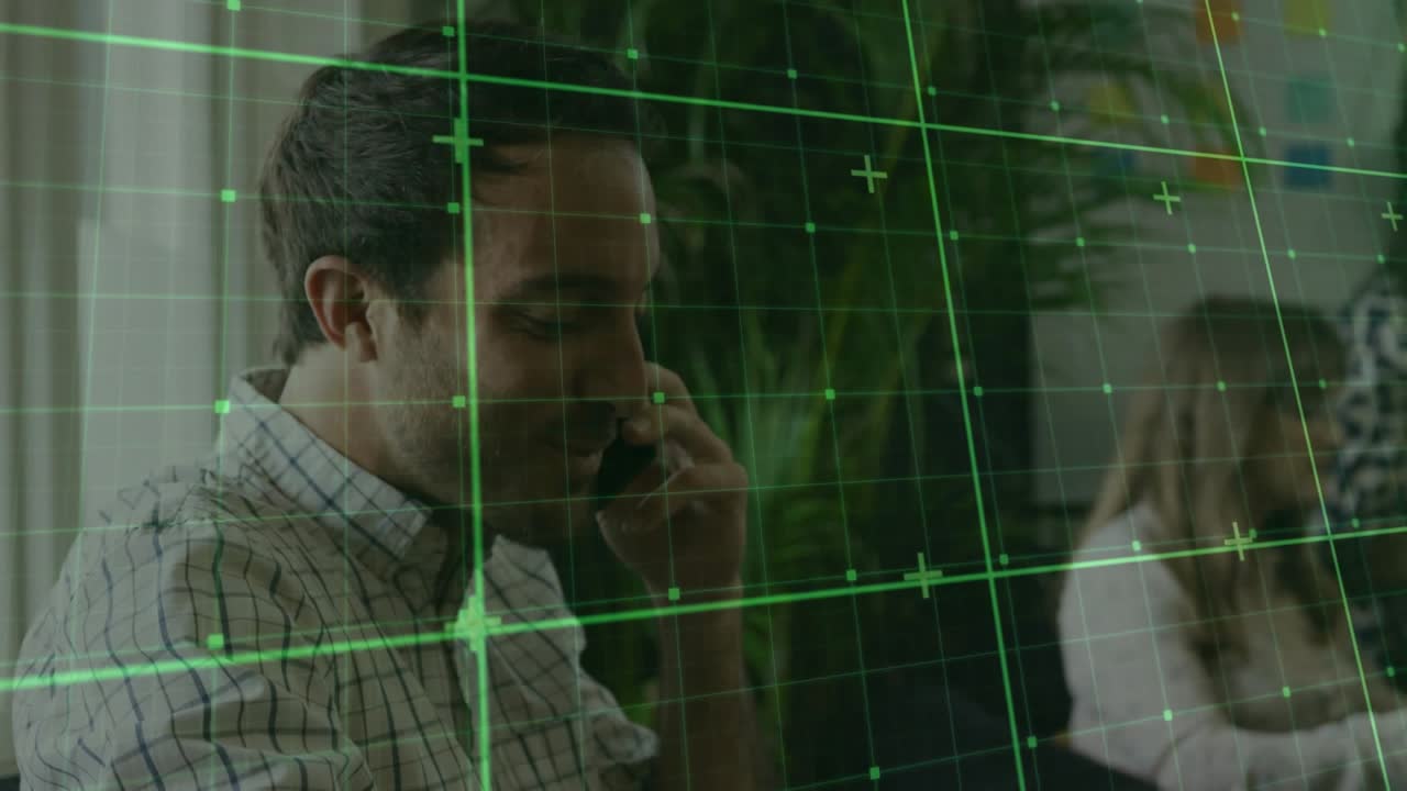 Man bringing handset to ear, speaking and listening in office for sales call, green grid overlaying