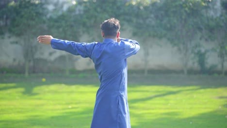 indian man doing exercise in morning