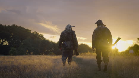 hunters at sunset
