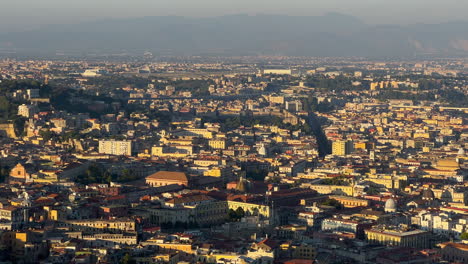 panoramic view of a sprawling city from above in naples, italy