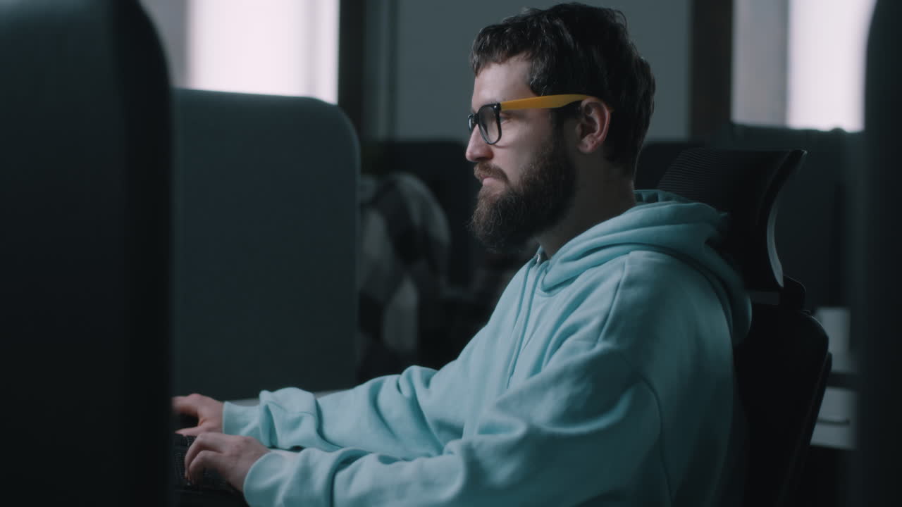 Man working on computer in office