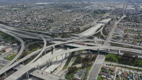 AERIAL:-Spectacular-Judge-Pregerson-Interchange-showing-multiple-Roads,-Bridges,-Highway-with-little-car-traffic-in-Los-Angeles,-California-on-Beautiful-Sunny-Day