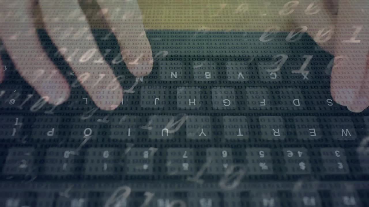 Animation of binary coding over person typing on computer keyboard