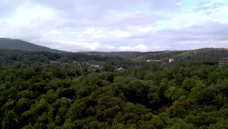 Town-of-blowing-rock-nc,-north-carolina-aerial-through-the-clouds