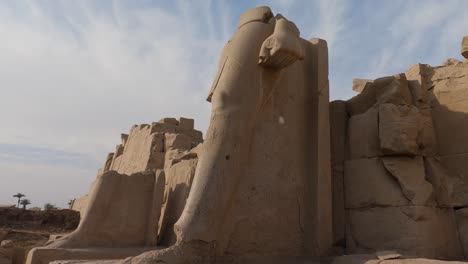 Ruins-of-statue-at-Karnak-Temple,-Luxor,-Egypt