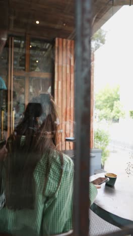 woman relaxing at a cafe