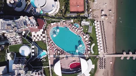 aerial view of a luxury resort complex with beach access