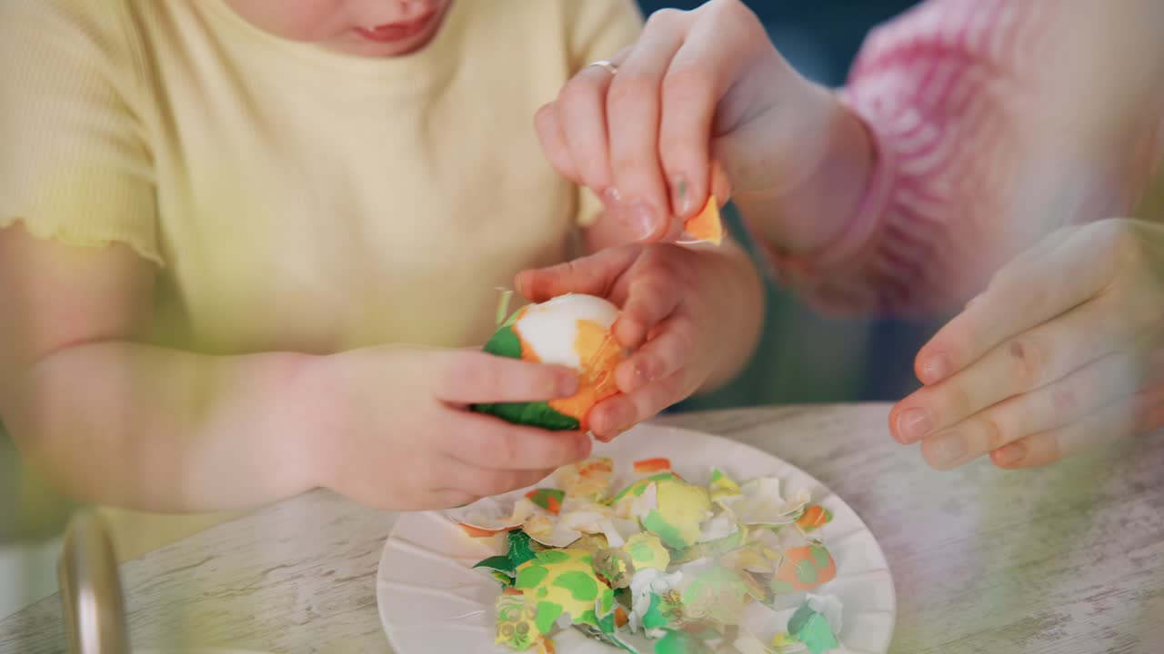 Child peels colorful candy with adult's help. Warm, focused moment. Joyful, patient, and educational. Perfect for holiday, family, or educational content. Safe, natural, and cheerful atmosphere