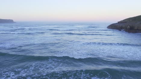 Bay-of-Biscay-sunset-seascape-from-Spain's-Cantabrian-peaceful-shore-AERIAL