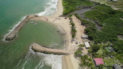 la sabana beach showing construction of a rompeola (breakwater) , aerial view