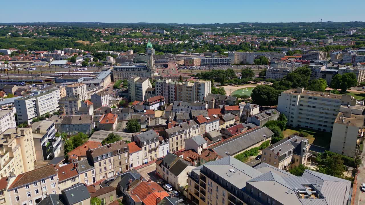 Limoges cityscape, Limoges-Bénédictins train station and Champ de Juillet park, France. Aerial drone view