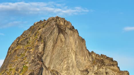 steep mountain peak of segla in senja island, norway - aerial shot