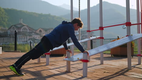 man performing push-ups outdoors