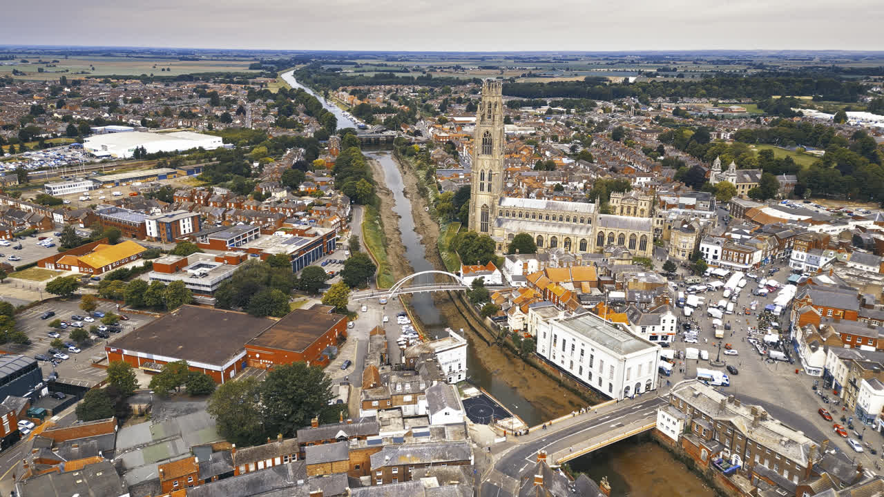 scenic beauty of Boston, Lincolnshire, in mesmerizing aerial drone footage: Port, ships, Saint Botolph Church , Saint Botolph's Bridge