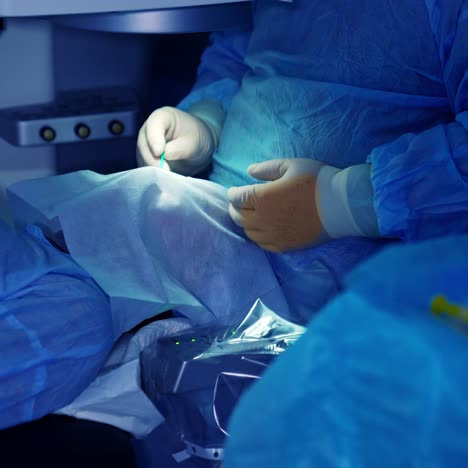 surgery at medical ophthalmology clinic. doctor at ophthalmology surgery during laser vision correction