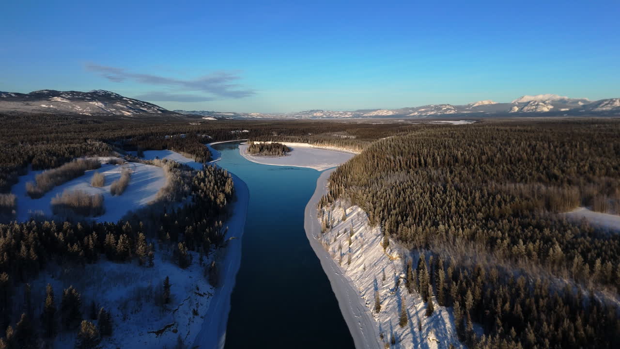 Yukon River And Lake Laberge During Winter In Canada - Drone Shot