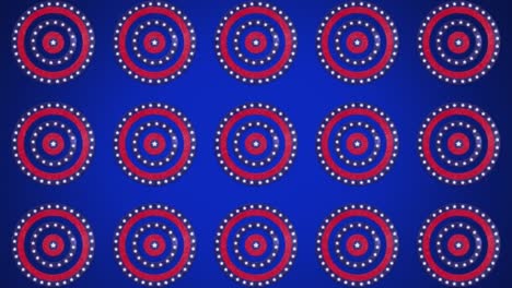 Animation-of-rows-of-circles-spinning-with-American-flag-stars-and-stripes-over-blue-background