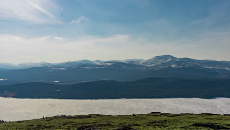 timelapse of a frozen lake in the sun