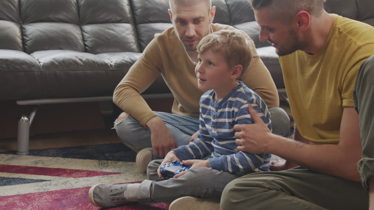 Gay Fathers and Son Playing Video Game