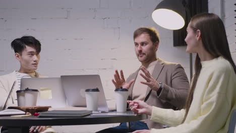 group of diverse colleagues having a team meeting in the boardroom 2