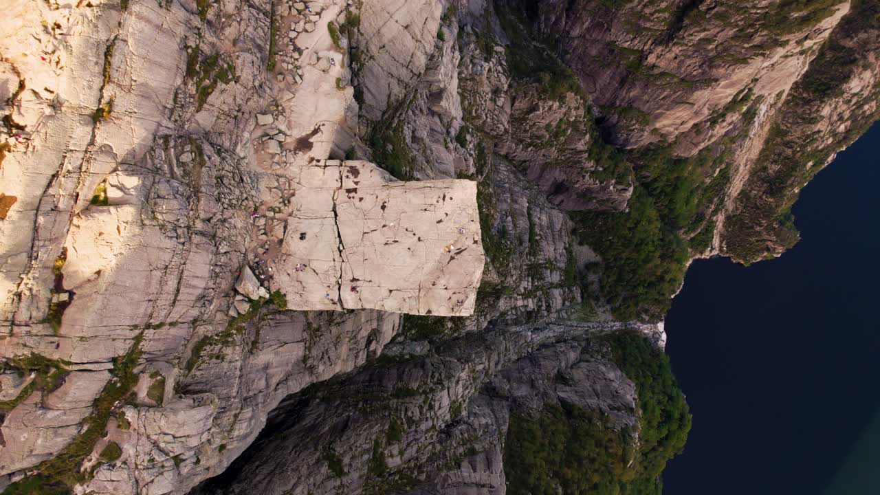 Breathtaking high-altitude view of Preikestolen rock formation and Lysefjord coastline. Scenic Norway