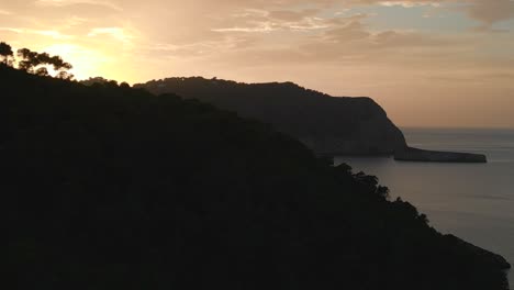 ibiza mountain sunset colorful benirras bay island