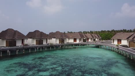 aerial view of water houses, from a resort in the maldives